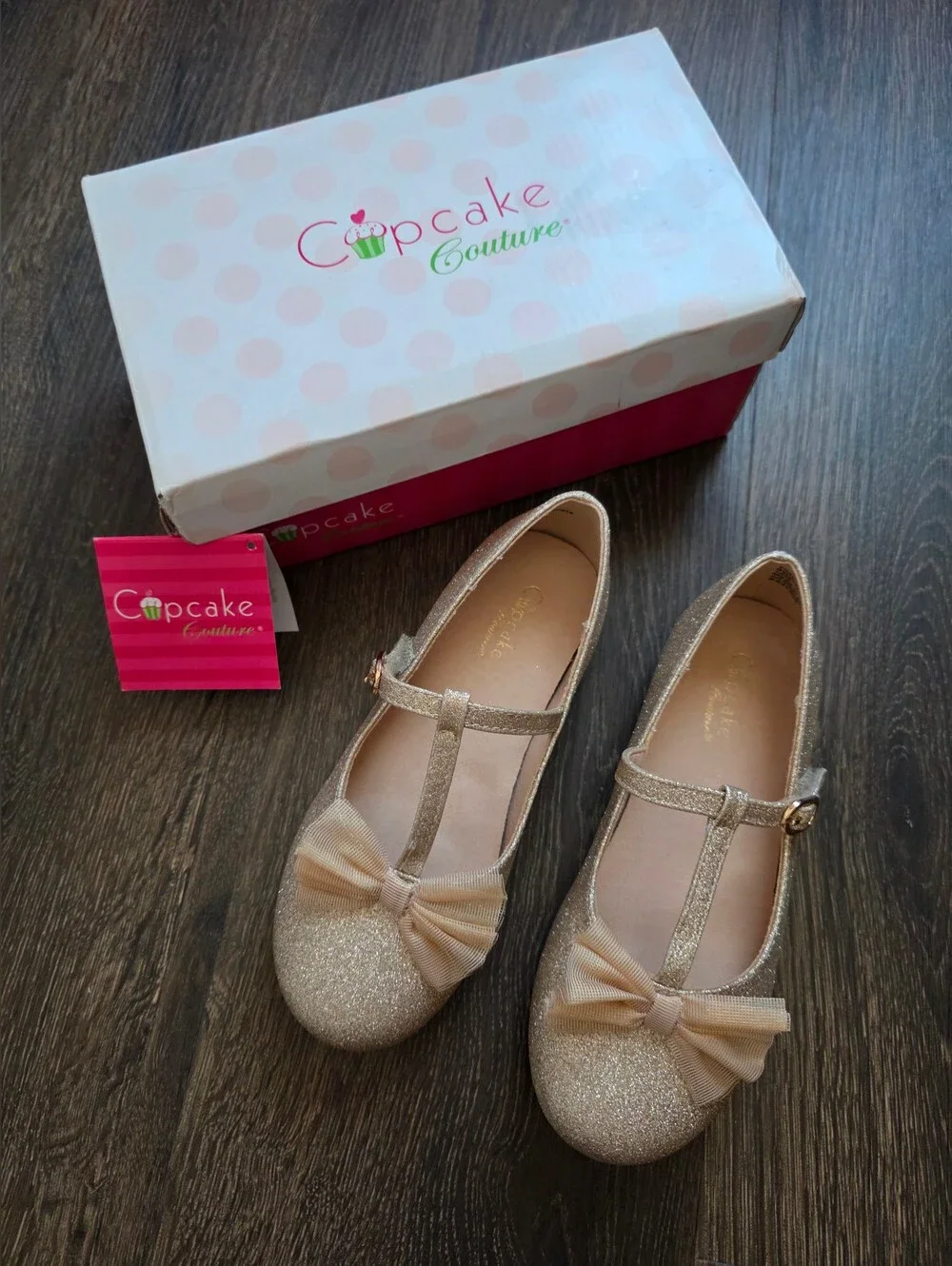 Cupcake Couture gold shimmer bow t-strap flats